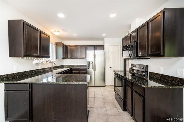 29406 Woodpark Circle, Warren, MI 48092