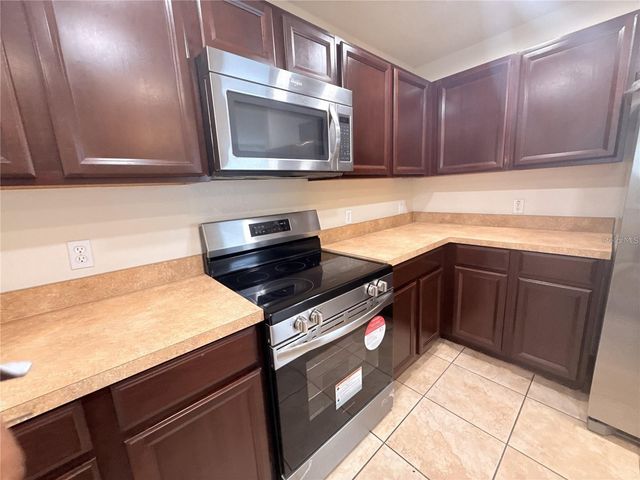 307 PRICKLE PEAR COURT 64, Orlando, FL 32824