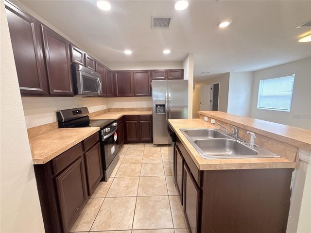 307 PRICKLE PEAR COURT 64, Orlando, FL 32824