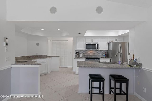 7196 Crown Oaks Drive, Spring Hill, FL 34606