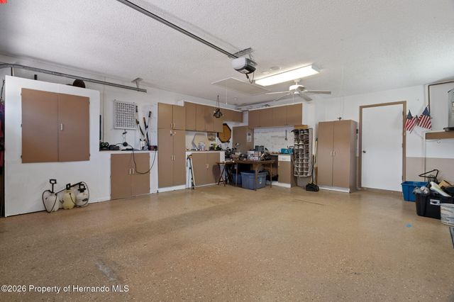 7196 Crown Oaks Drive, Spring Hill, FL 34606