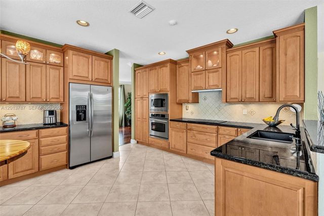 103 Cameron Ct, Weston, FL 33326