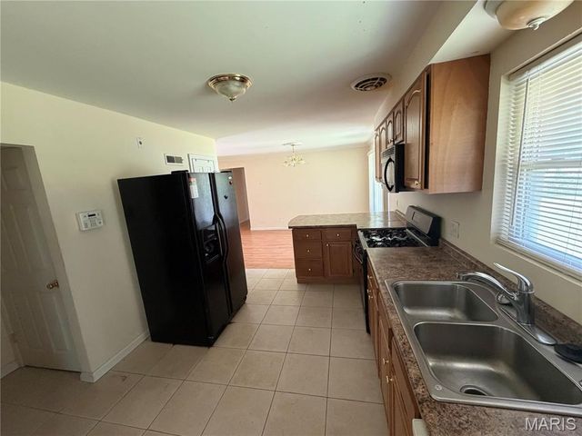 10044 Grosvenor Drive, Riverview, MO 63137