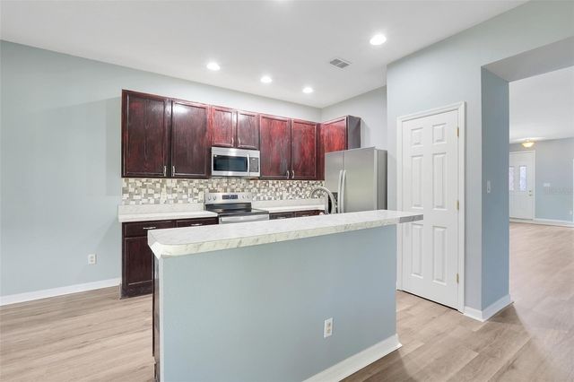 1141 GREENLEY AVENUE, Groveland, FL 34736