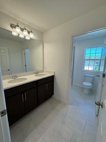 1494 WOODMONT BOULEVARD, Kissimmee, FL 34746