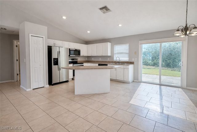 528 Peerless CIR, Lehigh Acres, FL 33974