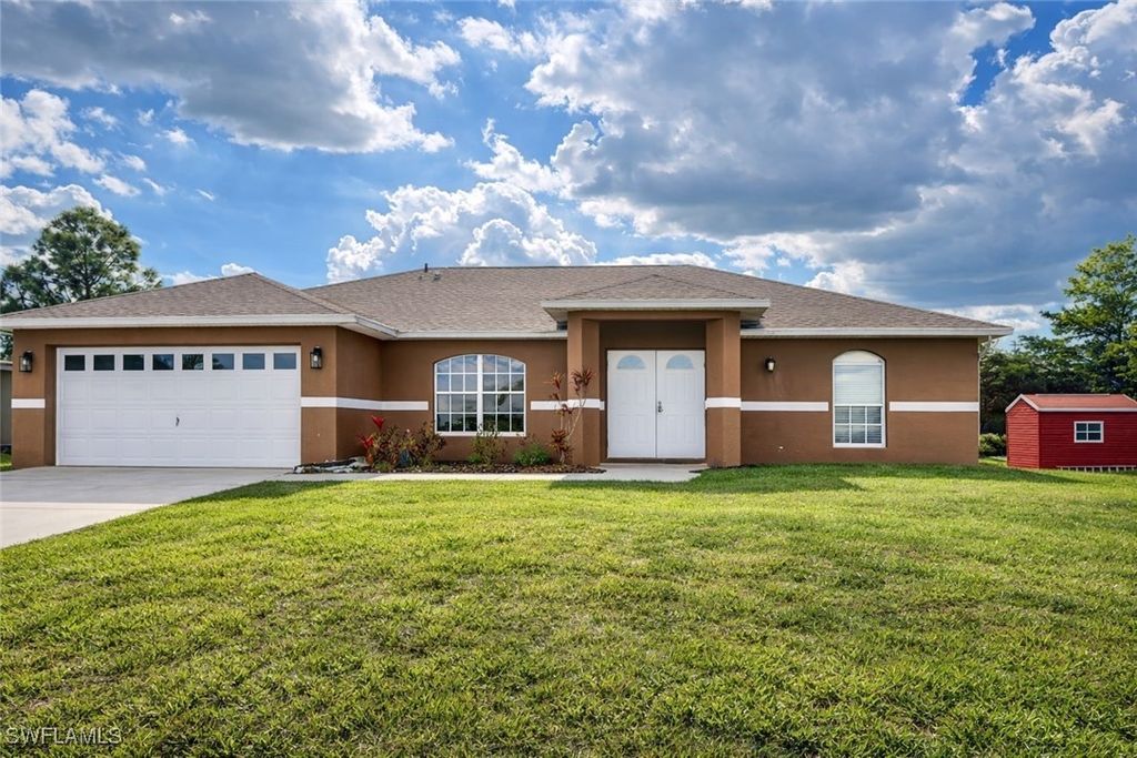 528 Peerless CIR, Lehigh Acres, FL 33974