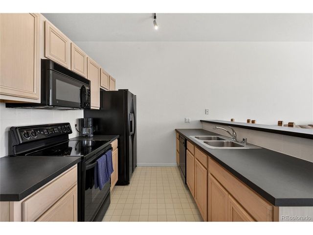 15475 Andrews Dr 406, Denver, CO 80239