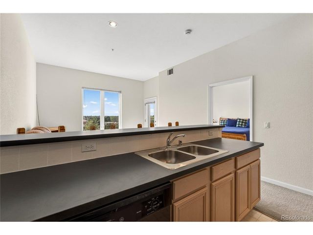 15475 Andrews Dr 406, Denver, CO 80239