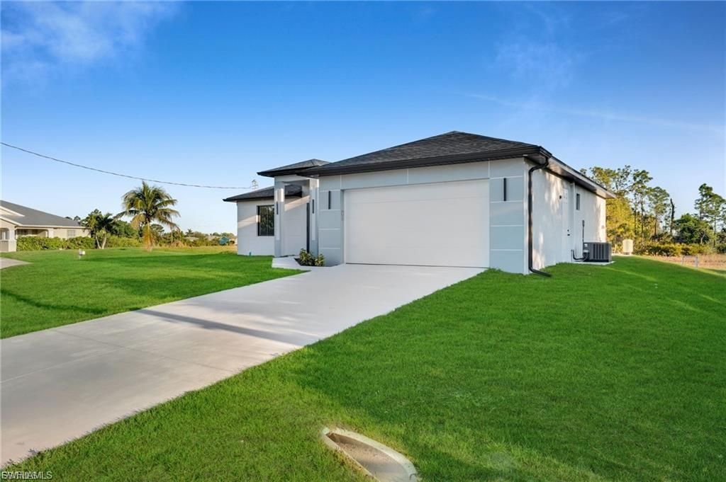 2106 W 18th ST, LEHIGH ACRES, FL 33972 — photo 4