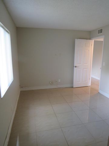 335 Pine Ridge Circle D-1, Greenacres, FL 33463