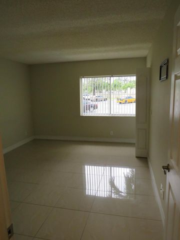 335 Pine Ridge Circle D-1, Greenacres, FL 33463