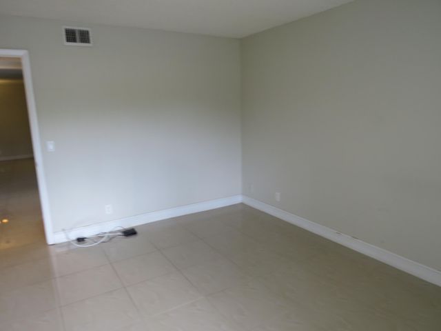 335 Pine Ridge Circle D-1, Greenacres, FL 33463