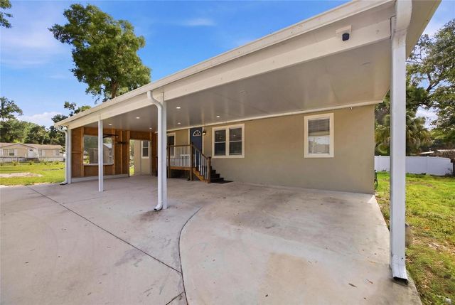 11821 GROVEWOOD AVENUE, Thonotosassa, FL 33592