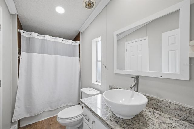 11821 GROVEWOOD AVENUE, Thonotosassa, FL 33592