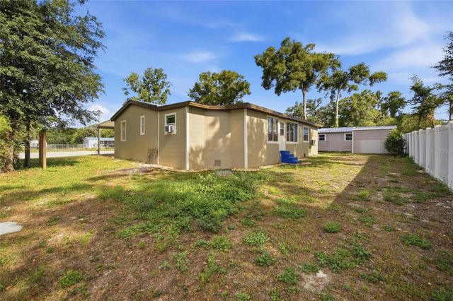11821 GROVEWOOD AVENUE, Thonotosassa, FL 33592