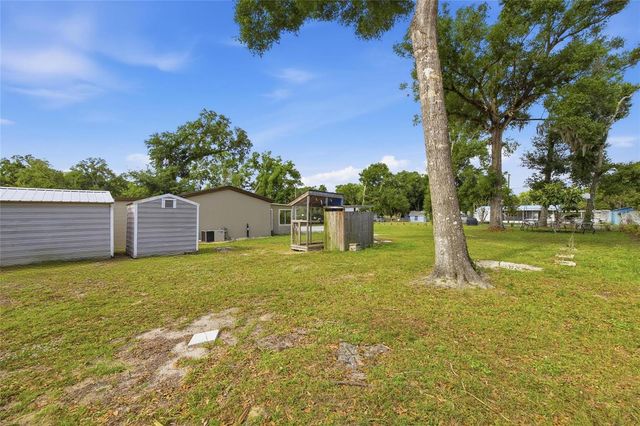 11821 GROVEWOOD AVENUE, Thonotosassa, FL 33592