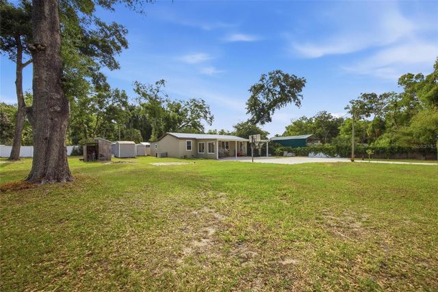 11821 GROVEWOOD AVENUE, Thonotosassa, FL 33592