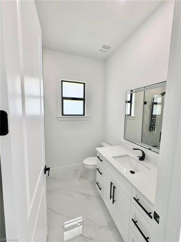 219 Malden AVE S, Lehigh Acres, FL 33974