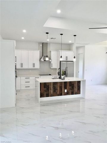 219 Malden AVE S, Lehigh Acres, FL 33974