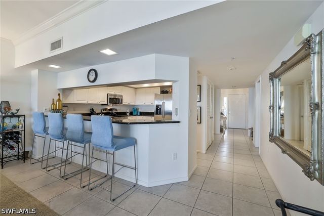 25 Bluebill AVE 1103, Naples, FL 34108