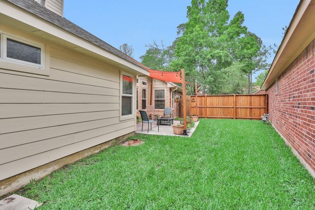 7 Cypress Bayou Court, The Woodlands, TX 77382
