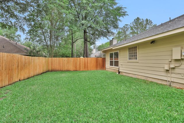 7 Cypress Bayou Court, The Woodlands, TX 77382