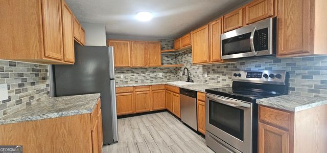 6131 Rockbridge Road, Stone Mountain, GA 30087