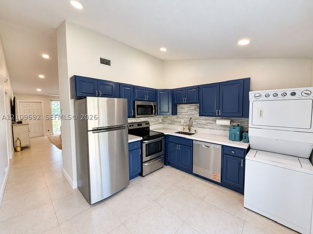 11169 NW 37th St ., Sunrise, FL 33351