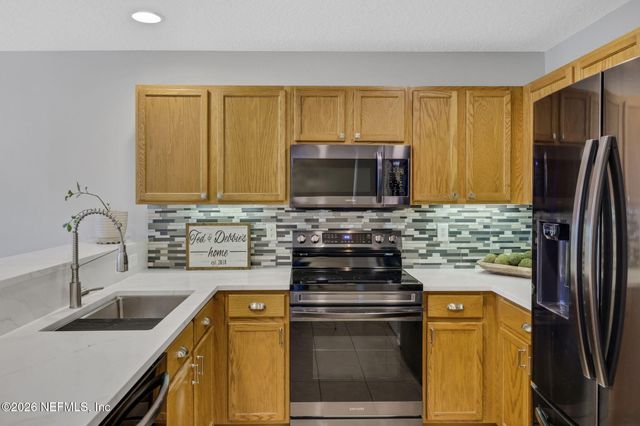 1500 CALMING WATER Drive 102, Fleming Island, FL 32003