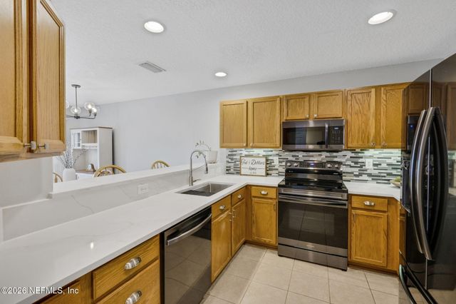 1500 CALMING WATER Drive 102, Fleming Island, FL 32003