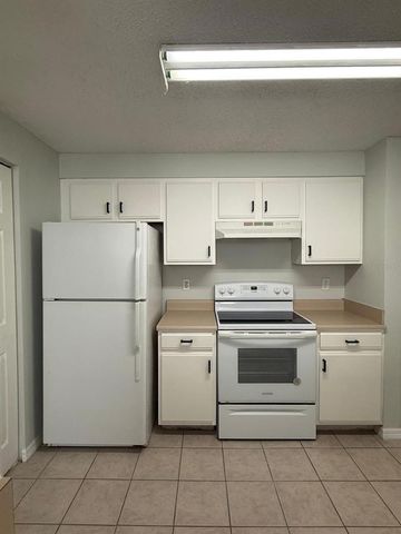 10831 WINDSOR WALK DRIVE 311, Orlando, FL 32837