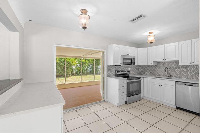 4813 LAKE CHARLES DRIVE N, Kenneth City, FL 33709