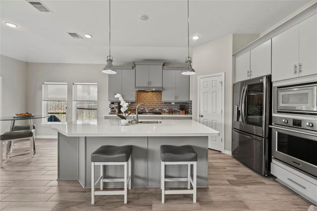 11211 Puckett River Drive, Cypress, TX 77433