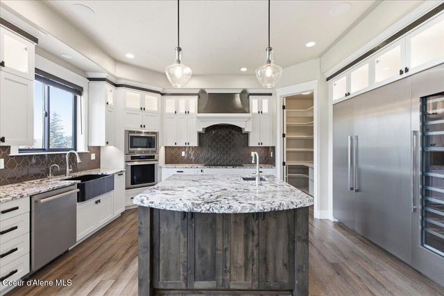 11231 N MCCALL FALLS DR, Hayden, ID 83835