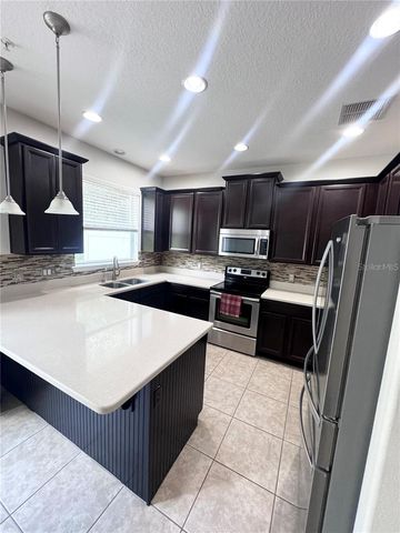 9319 STRONGBARK LANE, Orlando, FL 32832