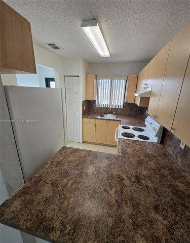 6151 W 24th Avenue 112, Hialeah, FL 33016