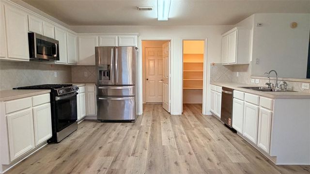 15627 Haleys Landing Lane, Houston, TX 77095