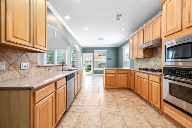 6411 Greencreek Meadows Lane, Spring, TX 77379