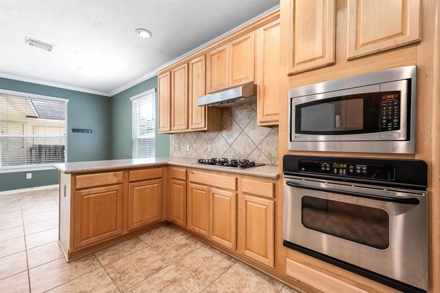 6411 Greencreek Meadows Lane, Spring, TX 77379