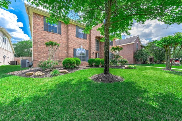 6411 Greencreek Meadows Lane, Spring, TX 77379