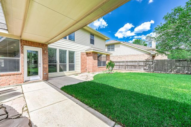 6411 Greencreek Meadows Lane, Spring, TX 77379