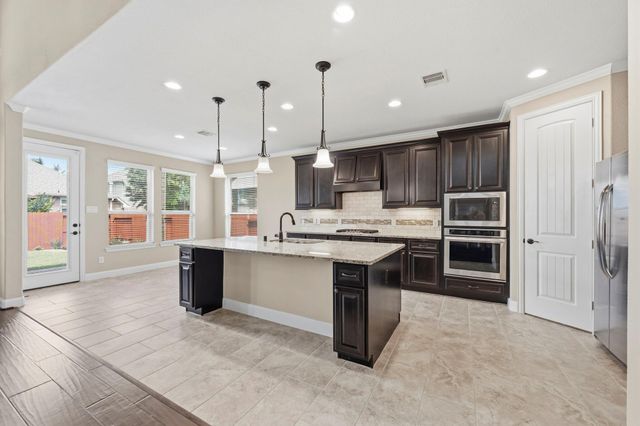 25210 Gaddis Oaks Drive, Spring, TX 77389