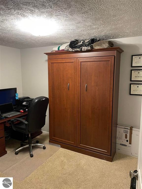 Image 26 of property listing at 5591 Millbrook Drive # 45, Williamsburg, MI 49690