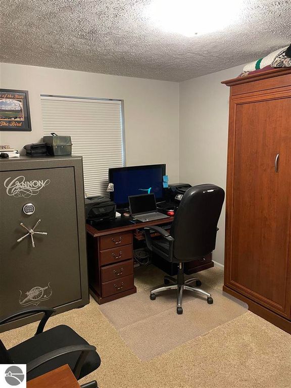 Image 27 of property listing at 5591 Millbrook Drive # 45, Williamsburg, MI 49690