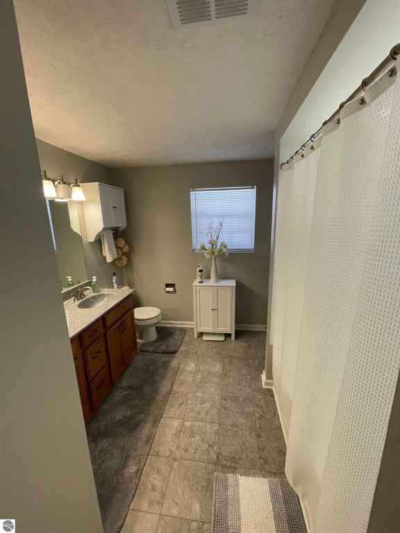 Image 28 of property listing at 5591 Millbrook Drive # 45, Williamsburg, MI 49690