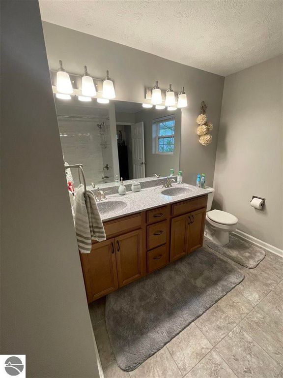 Image 29 of property listing at 5591 Millbrook Drive # 45, Williamsburg, MI 49690