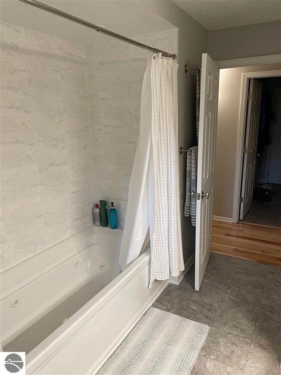 Image 30 of property listing at 5591 Millbrook Drive # 45, Williamsburg, MI 49690