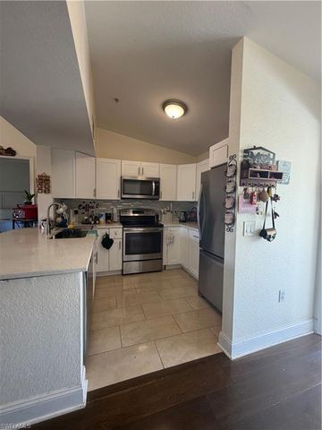 8214 Key Royal Cir Key Royal 131, Naples, FL 34119