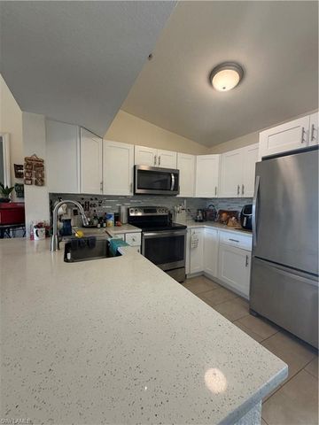 8214 Key Royal Cir Key Royal 131, Naples, FL 34119